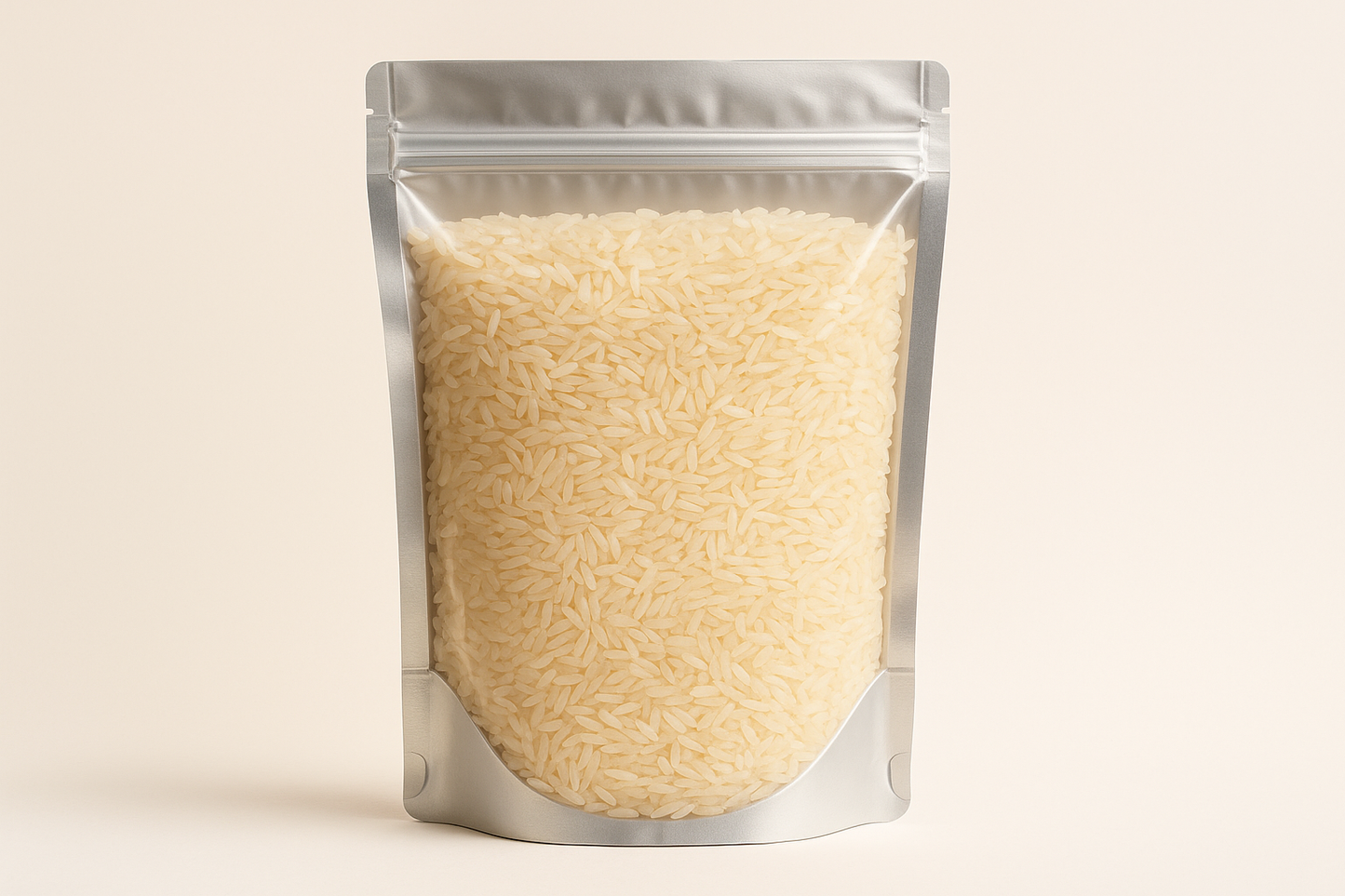 A highly realistic, front-facing product photo of a 1kg stand-up pouch made of aluminum with a fully transparent front from top to bottom, clearly showing the contents inside. The contents should be Egyptian rice, packed naturally with realistic textures and lighting. The aluminum is only visible on the sides and a small portion at the bottom. The image should have soft, natural shadows and plain background (hex #faf6f1). No text, labels, or branding just the pouch and its contents.