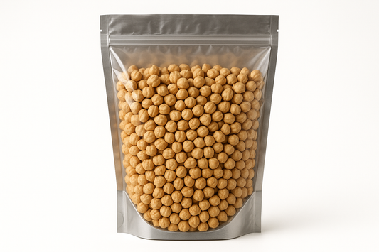 A highly realistic, front-facing product photo of a 1kg stand-up pouch made of aluminum with a fully transparent front from top to bottom, clearly showing the contents inside. The contents should be Mexican chickpeas, packed naturally with realistic textures and lighting. The aluminum is only visible on the sides and a small portion at the bottom. The image should have soft, natural shadows and no background (plain white). No text, labels, or branding—just the pouch and its contents.