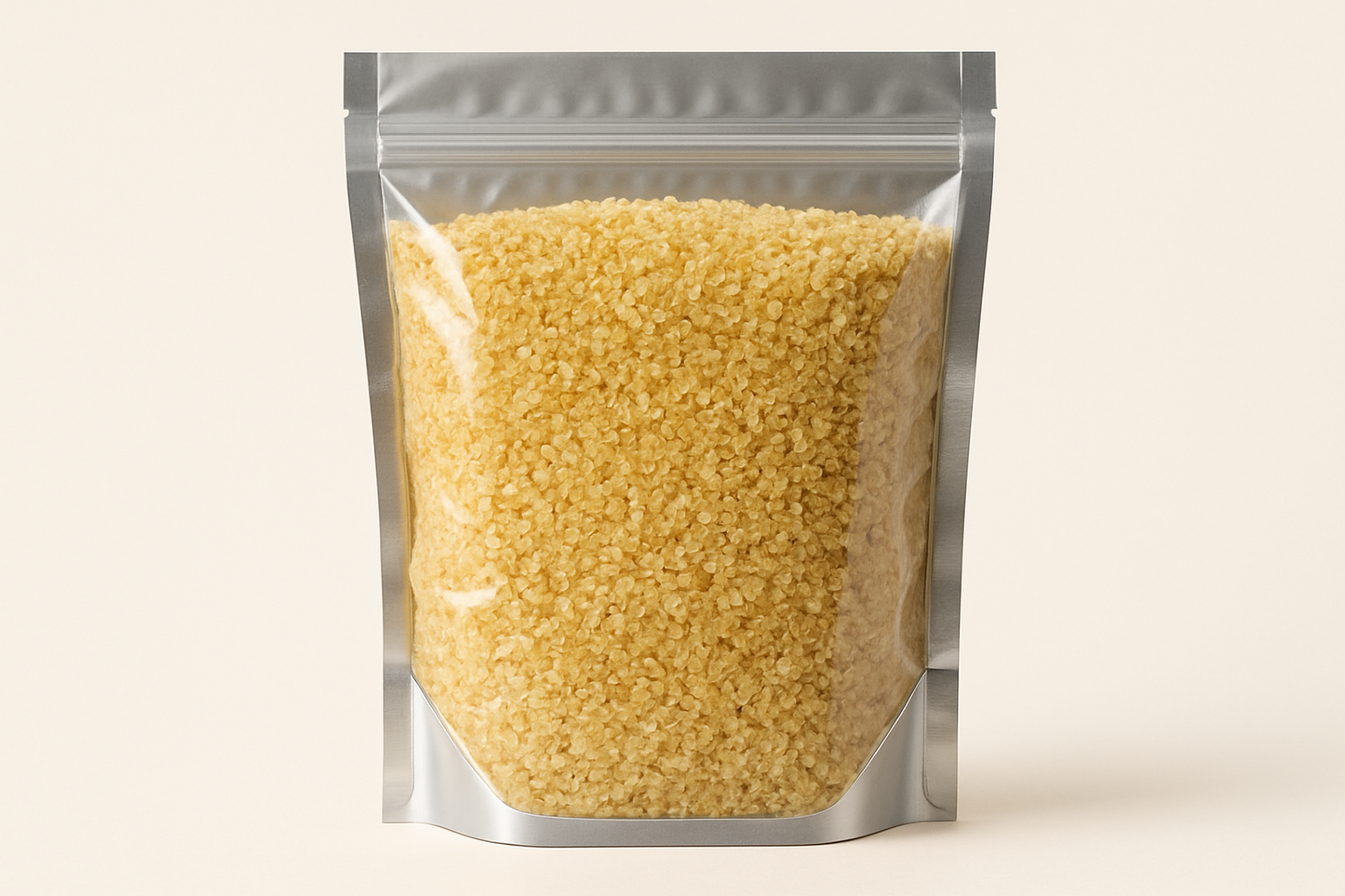 A highly realistic, front-facing product photo of a 1kg stand-up pouch made of aluminum with a fully transparent front from top to bottom, clearly showing the contents inside. The contents should be light coarse bulgur, packed naturally with realistic textures and lighting. The aluminum is only visible on the sides and a small portion at the bottom. The image should have soft, natural shadows and plain background (hex #faf6f1). No text, labels, or branding just the pouch and its contents.