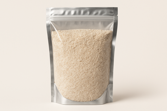 A highly realistic, front-facing product photo of a 1kg stand-up pouch made of aluminum with a fully transparent front from top to bottom, clearly showing the contents inside. The contents should be whole wheat flour, packed naturally with realistic textures and lighting. The aluminum is only visible on the sides and a small portion at the bottom. The image should have soft, natural shadows and plain background (hex #faf6f1). No text, labels, or branding just the pouch and its contents.